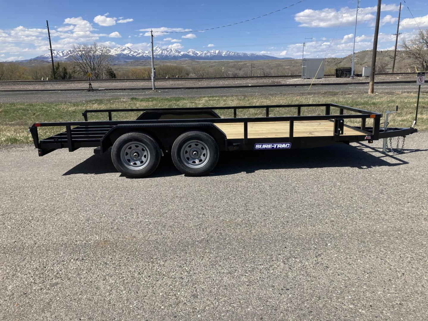 2025 , located at 310 West 1st Ave, Big Timber, MT, 59011, (406) 901-0517, 45.833511, -109.957809 - SureTrac 7 x 16 tube Top Utility - 7K GVW, (2) 3.5k axles with quick lube hubs, electric brakes on all wheels, spring suspension, all LED lights, 15" radial tires, 2k set back jack, rear mesh ramp, safety chains, battery breakaway switch, (13") tall 2 x 2 tube top rail, stake pockets, (3) position r - Photo#0