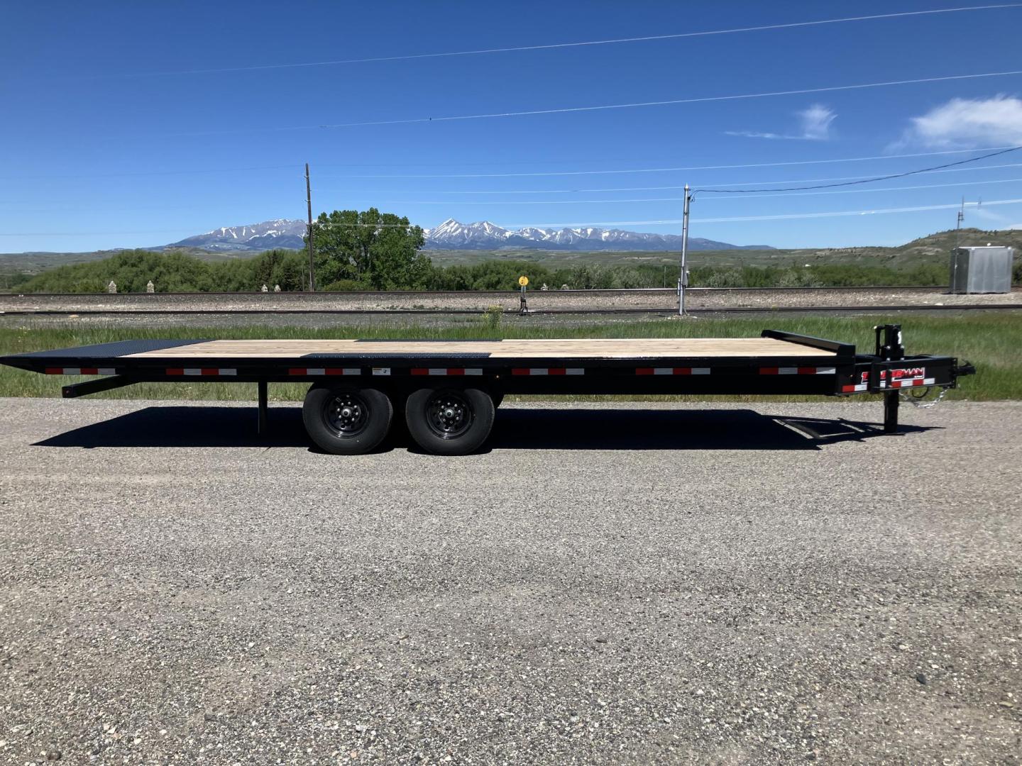 2025 , located at 310 West 1st Ave, Big Timber, MT, 59011, (406) 901-0517, 45.833511, -109.957809 - New Trailerman 81/2 x 24 Power Tilt deckover, 14K GVW, (2) 7k axles with electric brakes and quick lube hubs, HD slipper spring suspension, 12k drop leg jack, dual ram hoist with power up/down, wireless remote, 110V battery charger, all LED lights, 2-5/16" adjustable coupler, 16" - 10 ply radial tir - Photo#1