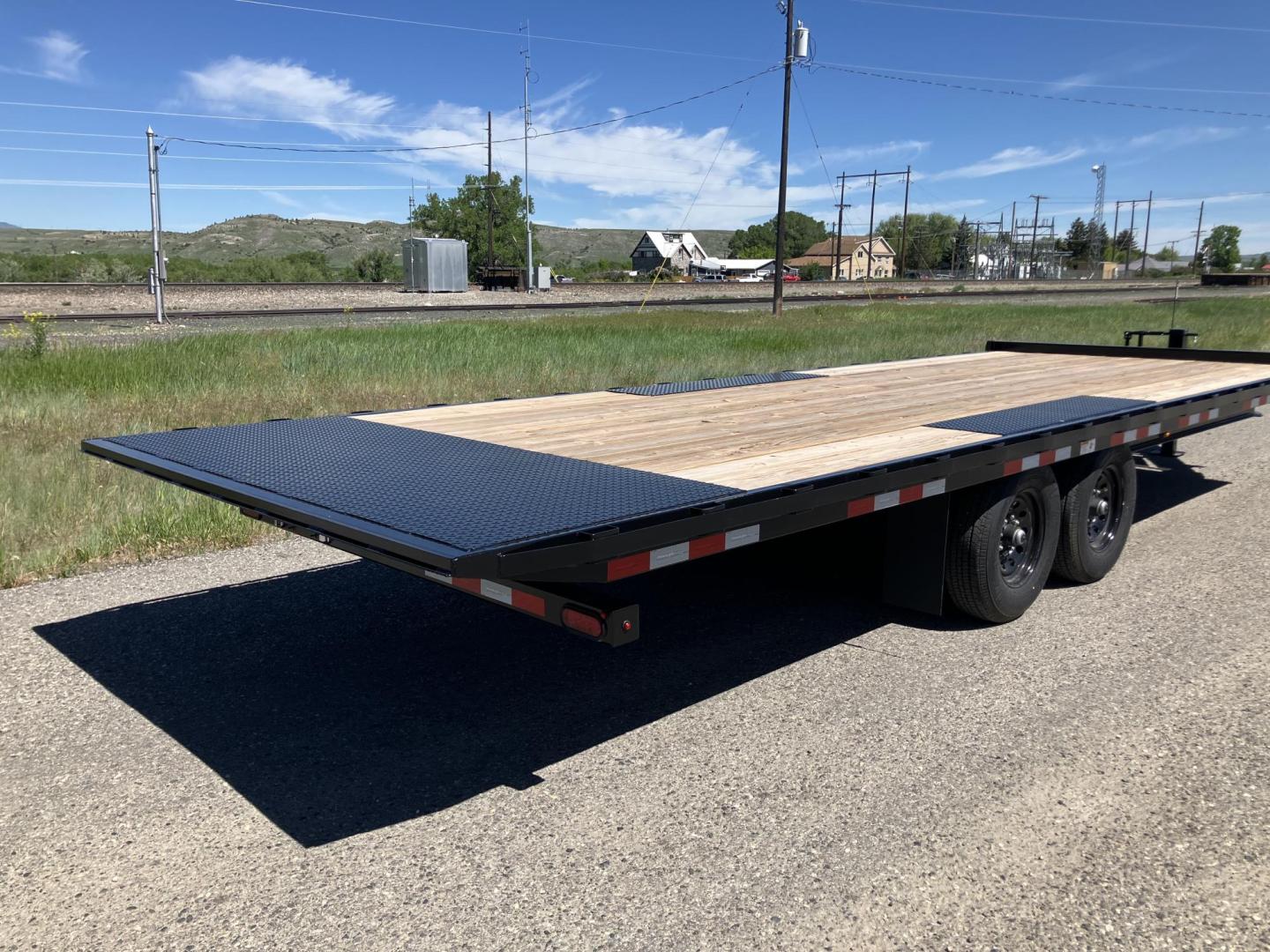 2025 , located at 310 West 1st Ave, Big Timber, MT, 59011, (406) 901-0517, 45.833511, -109.957809 - New Trailerman 81/2 x 24 Power Tilt deckover, 14K GVW, (2) 7k axles with electric brakes and quick lube hubs, HD slipper spring suspension, 12k drop leg jack, dual ram hoist with power up/down, wireless remote, 110V battery charger, all LED lights, 2-5/16" adjustable coupler, 16" - 10 ply radial tir - Photo#3