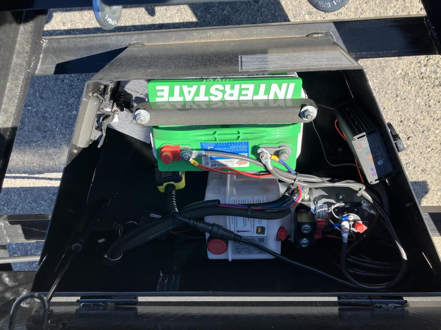 2025 , located at 310 West 1st Ave, Big Timber, MT, 59011, (406) 901-0517, 45.833511, -109.957809 - New Trailerman 81/2 x 24 Power Tilt deckover, 14K GVW, (2) 7k axles with electric brakes and quick lube hubs, HD slipper spring suspension, 12k drop leg jack, dual ram hoist with power up/down, wireless remote, 110V battery charger, all LED lights, 2-5/16" adjustable coupler, 16" - 10 ply radial tir - Photo#4