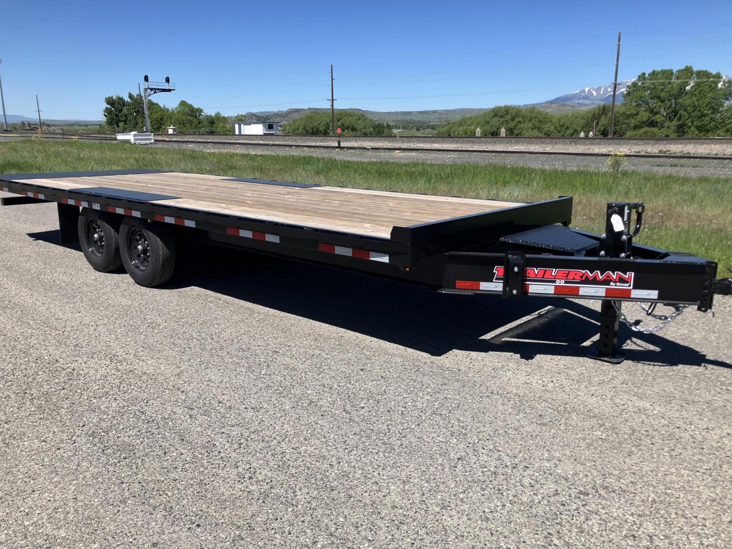 2025 , located at 310 West 1st Ave, Big Timber, MT, 59011, (406) 901-0517, 45.833511, -109.957809 - New Trailerman 81/2 x 24 Power Tilt deckover, 14K GVW, (2) 7k axles with electric brakes and quick lube hubs, HD slipper spring suspension, 12k drop leg jack, dual ram hoist with power up/down, wireless remote, 110V battery charger, all LED lights, 2-5/16" adjustable coupler, 16" - 10 ply radial tir - Photo#2