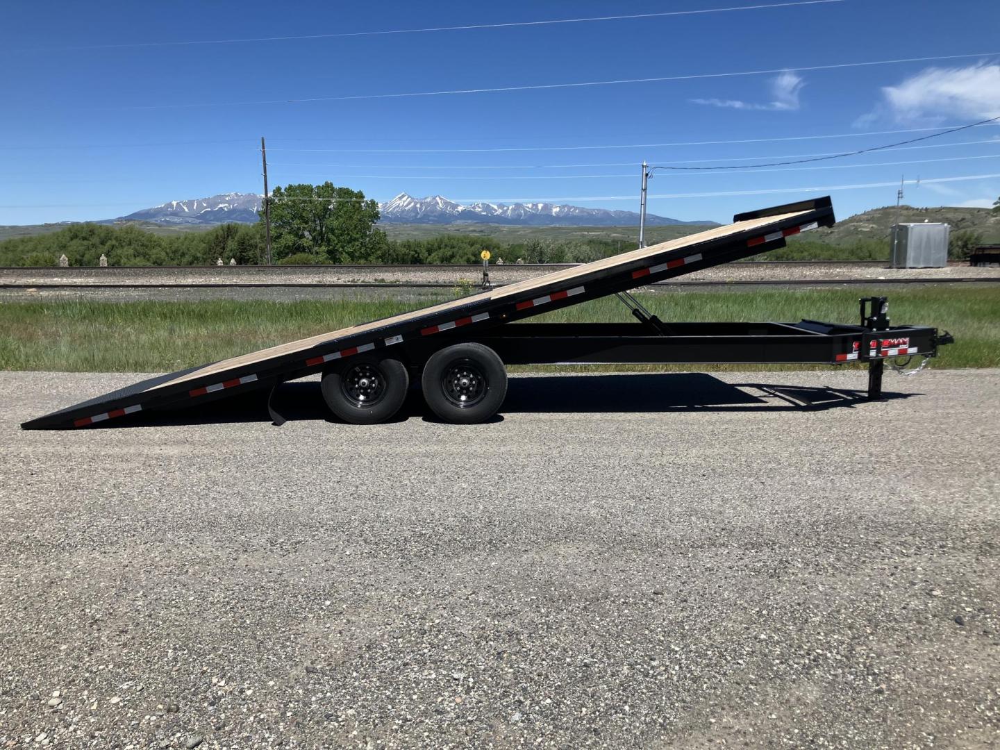 2025 , located at 310 West 1st Ave, Big Timber, MT, 59011, (406) 901-0517, 45.833511, -109.957809 - New Trailerman 81/2 x 24 Power Tilt deckover, 14K GVW, (2) 7k axles with electric brakes and quick lube hubs, HD slipper spring suspension, 12k drop leg jack, dual ram hoist with power up/down, wireless remote, 110V battery charger, all LED lights, 2-5/16" adjustable coupler, 16" - 10 ply radial tir - Photo#5