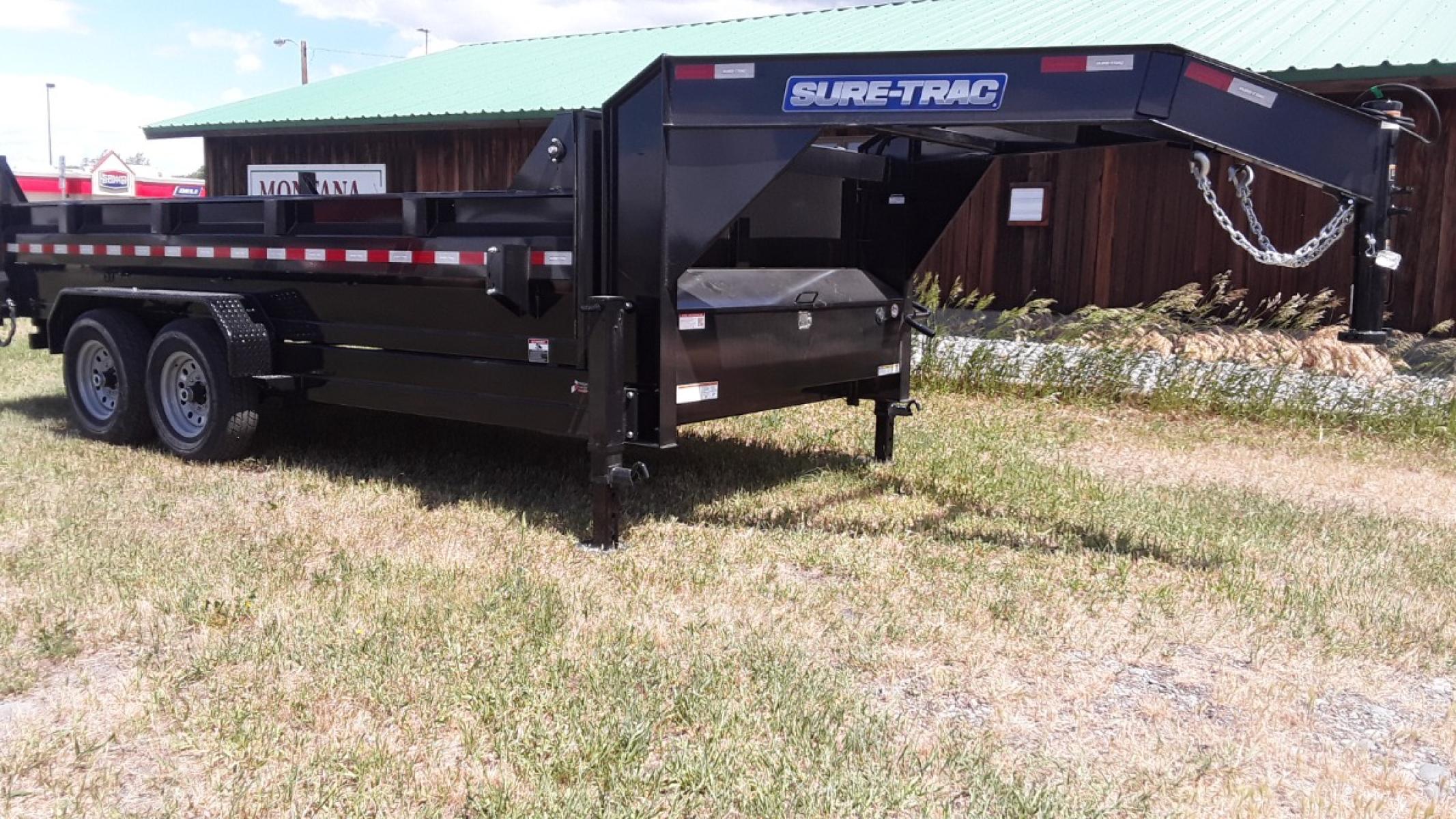 2022 Black SureTrac 7 x 14 LoPro Dump , located at 310 West 1st Ave, Big Timber, MT, 59011, (406) 860-8510, 45.833511, -109.957809 - SURE-TRAC 7 x 14 LO PRO DUMP TRAILER, 14K GVW, CHOICE OF DUAL RAM, SCISSOR OR TELESCOPIC HOIST, UNDERBODY TOOL STORAGE BOX, STAKE POCKETS ON SIDE, MESH TARP, 110 VOLT BATTERY CHARGER, SIDE STEP, EZ LUBE HUBS, HD SLIPPER SPRING SUSPENSION, 16" RADIAL 10 PLY TIRES, BRAKES BOTH AXLES, SPREADER-BARN DOO - Photo #7
