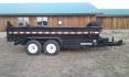 2025 Black SureTrac 7 x 14 LoPro Dump , located at 310 West 1st Ave, Big Timber, MT, 59011, (406) 901-0517, 45.833511, -109.957809 - SURE-TRAC 7 x 14 HD LO PRO DUMP TRAILER, 14K GVW, TELESCOPIC HOIST, UNDERBODY TOOL STORAGE BOX, STAKE POCKETS ON SIDE, MESH TARP, 110 VOLT BATTERY CHARGER, SIDE STEP, EZ LUBE HUBS, HD SLIPPER SPRING SUSPENSION, 16" RADIAL 10 PLY TIRES, BRAKES BOTH AXLES, SPREADER-BARN DOOR REAR GATE, REAR RAMPS, 10 - Photo#6