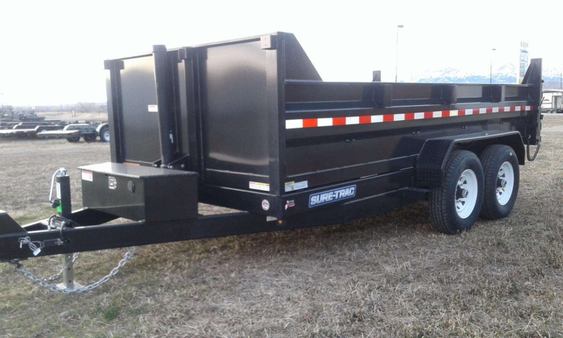 2025 Black SureTrac 7 x 14 LoPro Dump , located at 310 West 1st Ave, Big Timber, MT, 59011, (406) 901-0517, 45.833511, -109.957809 - SURE-TRAC 7 x 14 HD LO PRO DUMP TRAILER, 14K GVW, TELESCOPIC HOIST, UNDERBODY TOOL STORAGE BOX, STAKE POCKETS ON SIDE, MESH TARP, 110 VOLT BATTERY CHARGER, SIDE STEP, EZ LUBE HUBS, HD SLIPPER SPRING SUSPENSION, 16" RADIAL 10 PLY TIRES, BRAKES BOTH AXLES, SPREADER-BARN DOOR REAR GATE, REAR RAMPS, 10 - Photo#12