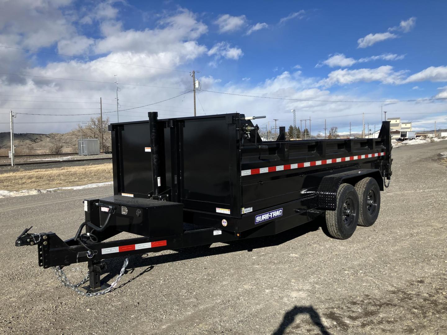 2025 Black SureTrac 7 x 14 LoPro Dump , located at 310 West 1st Ave, Big Timber, MT, 59011, (406) 901-0517, 45.833511, -109.957809 - SURE-TRAC 7 x 14 HD LO PRO DUMP TRAILER, 14K GVW, TELESCOPIC HOIST, UNDERBODY TOOL STORAGE BOX, STAKE POCKETS ON SIDE, MESH TARP, 110 VOLT BATTERY CHARGER, SIDE STEP, EZ LUBE HUBS, HD SLIPPER SPRING SUSPENSION, 16" RADIAL 10 PLY TIRES, BRAKES BOTH AXLES, SPREADER-BARN DOOR REAR GATE, REAR RAMPS, 10 - Photo#0