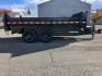 2025 Black SureTrac 7 x 14 LoPro Dump , located at 310 West 1st Ave, Big Timber, MT, 59011, (406) 901-0517, 45.833511, -109.957809 - SURE-TRAC 7 x 14 HD LO PRO DUMP TRAILER, 14K GVW, TELESCOPIC HOIST, UNDERBODY TOOL STORAGE BOX, STAKE POCKETS ON SIDE, MESH TARP, 110 VOLT BATTERY CHARGER, SIDE STEP, EZ LUBE HUBS, HD SLIPPER SPRING SUSPENSION, 16" RADIAL 10 PLY TIRES, BRAKES BOTH AXLES, SPREADER-BARN DOOR REAR GATE, REAR RAMPS, 10 - Photo#1
