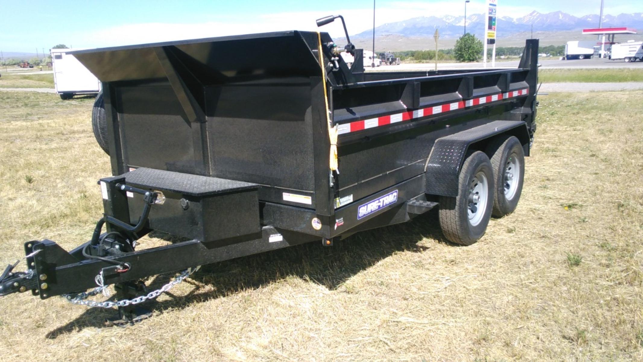 2022 Black SureTrac 7 x 12 LoPro Dump , located at 310 West 1st Ave, Big Timber, MT, 59011, (406) 860-8510, 45.833511, -109.957809 - SURETRAC 7 X 12 LOPRO DUMP, 14K GVW, 2 - 7K AXLES W- ELECTRIC BRAKES, HD SLIPPER SPRING SUSPENSION AND EZ LUBE HUBS, DUAL REAR GATE, REAR RAMPS, LED LIGHTS, 16" - 10 PLY RADIAL TIRES, 10 GA FLOOR, (5) D-RING TIE DOWNS. SPARE MOUNT, 12K DROP LEG JACK, DEEP CYCLE BATTERY, MESH TARP, 110 VOLT BATTERY C - Photo #2