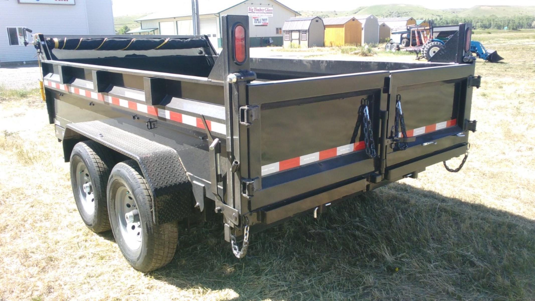 2022 Black SureTrac 7 x 12 LoPro Dump , located at 310 West 1st Ave, Big Timber, MT, 59011, (406) 860-8510, 45.833511, -109.957809 - SURETRAC 7 X 12 LOPRO DUMP, 14K GVW, 2 - 7K AXLES W- ELECTRIC BRAKES, HD SLIPPER SPRING SUSPENSION AND EZ LUBE HUBS, DUAL REAR GATE, REAR RAMPS, LED LIGHTS, 16" - 10 PLY RADIAL TIRES, 10 GA FLOOR, (5) D-RING TIE DOWNS. SPARE MOUNT, 12K DROP LEG JACK, DEEP CYCLE BATTERY, MESH TARP, 110 VOLT BATTERY C - Photo #3