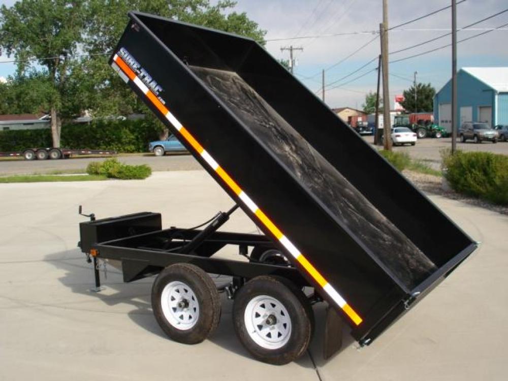 2022 Black SureTrac 6 x 10 Deckover Dump Trailer , located at 310 West 1st Ave, Big Timber, MT, 59011, (406) 860-8510, 45.833511, -109.957809 - ONE OF THE LITTLE WORKHORES'- THIS DECKOVER DUMP IS GREAT FOR AROUND THE HOUSE AND SMALL ACERAGES. DON'T LET THE SIZE AND PRICE FOOL YOU, THIS UNIT WILL DO A LOT OF WORK! 6' X 10' DECKOVER DUMP, 7K GVW, SINGLE RAM HOIST, DUAL REAR GATE, BRAKES BOTH AXLES, EZ LUBE HUBS, LED LIGHTS, POWDERCOAT FINIS - Photo #1