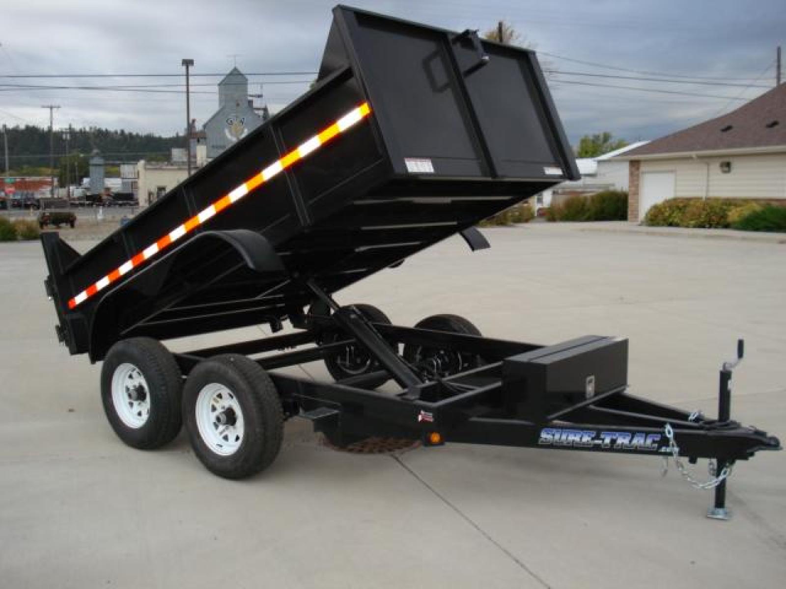 2022 Black SureTrac 6 x10 Lo Pro Dump Trailer , located at 310 West 1st Ave, Big Timber, MT, 59011, (406) 860-8510, 45.833511, -109.957809 - SURE-TRAC 6 X 10 LO PRO DUMP TRAILER, 10K GVW, SINGLE RAM HOIST, EZ LUBE HUBS, DUAL REAR GATE, BRAKES BOTH AXLES, EZ LUBE HUBS, (5) D-RING TIE-DOWNS, LED LIGHTS, POWDER COAT FINISH, REAR RAMPS, MESH TARP, DEEP CYCLE BATTERY. OPTIONS: SPARE TIRE $165.00. THE BEST TRAILERS AT THE BEST PRICE!!! - Photo #1