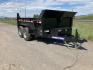 2025 Black SureTrac 6 x10 Lo Pro Dump Trailer , located at 310 West 1st Ave, Big Timber, MT, 59011, (406) 901-0517, 45.833511, -109.957809 - SURE-TRAC 6 X 10 LO PRO DUMP TRAILER, 10K GVW, SINGLE RAM HOIST WITH POWER UP/DOWN, EZ LUBE HUBS, DUAL REAR GATE, ELECTRIC BRAKES BOTH AXLES, (5) D-RING TIE-DOWNS, LED LIGHTS, REAR STOW RAMPS, MESH TARP, DEEP CYCLE BATTERY, 225-15" - 8 PLY RADIAL TIRES, SPARE TIRE CARRIER, 7K DROP FOOT JACK, LOCKABL - Photo#1