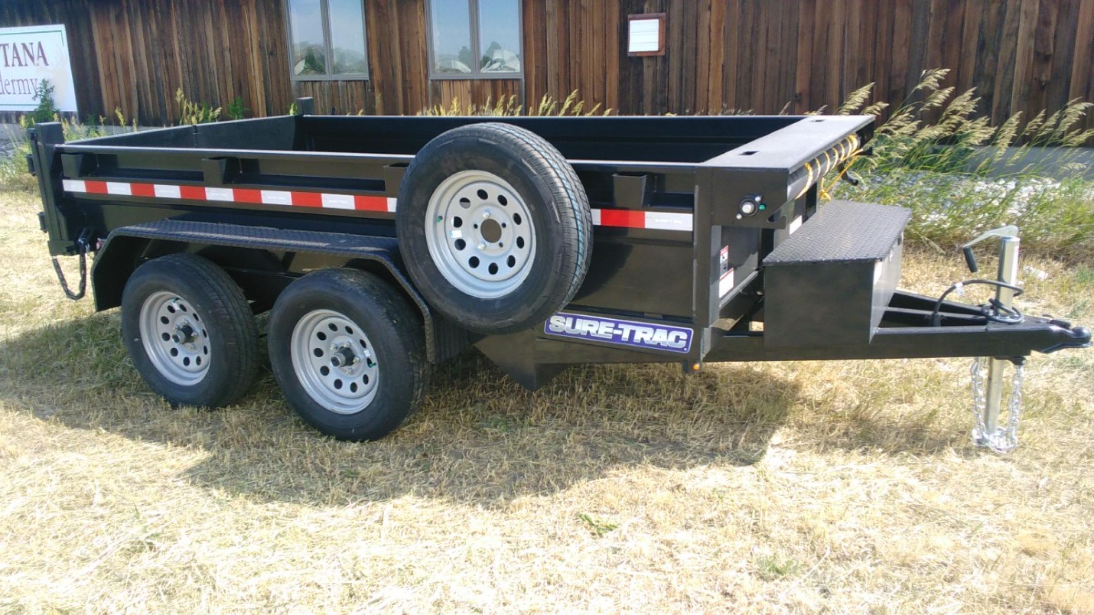 2022 Black SureTrac 5 x 10 LoPro Dump , located at 310 West 1st Ave, Big Timber, MT, 59011, (406) 860-8510, 45.833511, -109.957809 - SURE-TRAC 5 X 10 LO PRO DUMP TRAILER, 7K GVW, EZ LUBE AXLES, SINGLE RAM HOIST, DUAL REAR GATE, LED LIGHTS, 15" RADIAL TIRES, (5) D-RING TIE-DOWNS, POWDER COAT FINISH. DEEP CYCLE BATTERY, BATTERY CHARGER, MESH TARP. OPTIONS: SPARE TIRE - $165.00. THE BEST TRAILERS AT THE BEST PRICE!!! - Photo #3