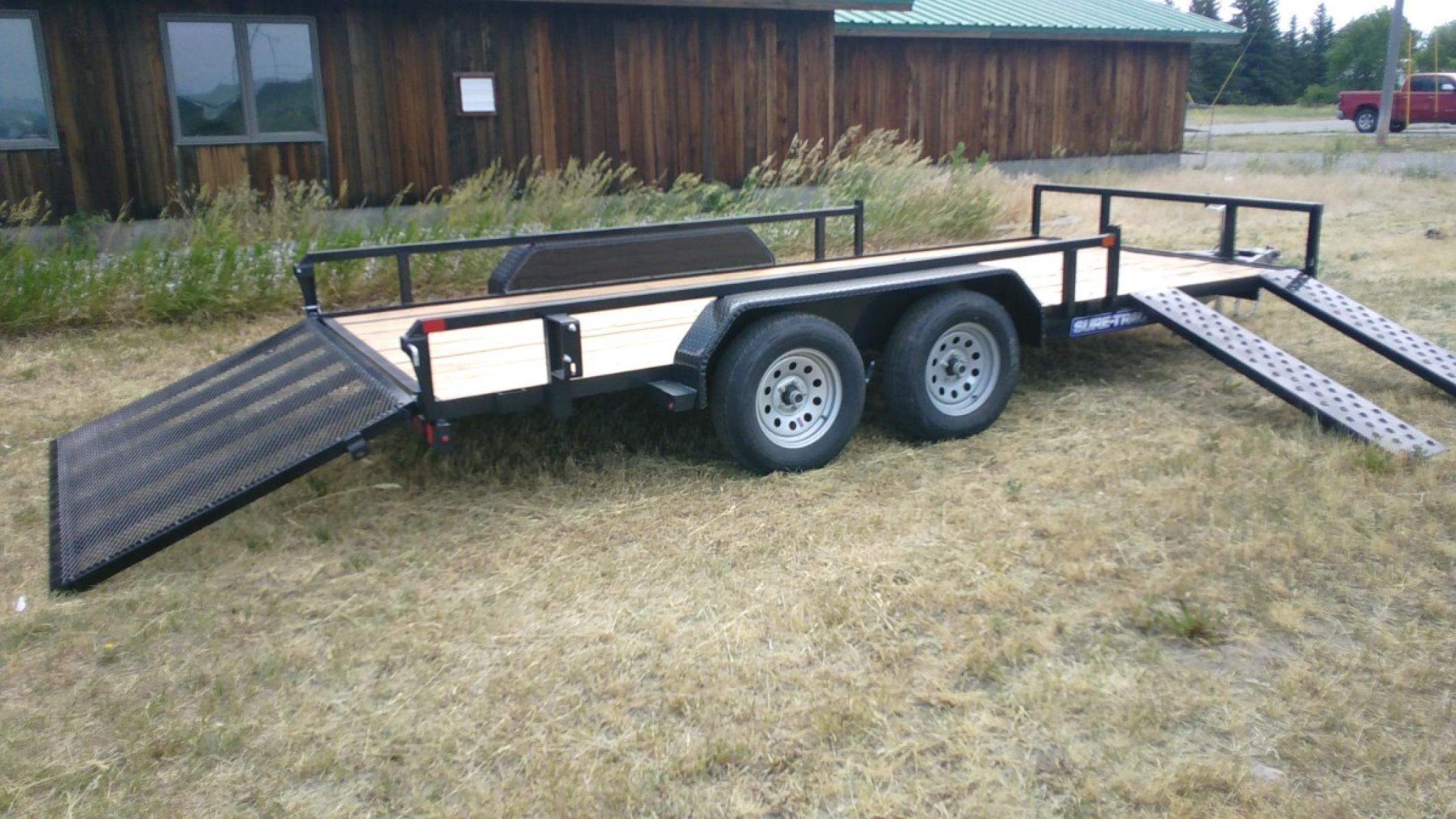 2023 Black SureTrac 7 x 16 Utility ATV , located at 310 West 1st Ave, Big Timber, MT, 59011, (406) 860-8510, 45.833511, -109.957809 - SURE-TRAC 7 X 16 TUBE TOP ATV, 7K GVW, SIDE AND REAR RAMPS, 15" RADIAL TIRES, BRAKES BOTH AXLES, EASY LUBE HUBS, LED LIGHTS, TREATED WOOD DECK, POWDER COAT FINISH, WIRING RUN IN CONDUIT, STAKE POCKETS, SPRING ASSIST REAR RAMP, SPARE TIRE MOUNT. OPTION: Spare Tire - $165.00. THE BEST TRAILERS AT - Photo #5