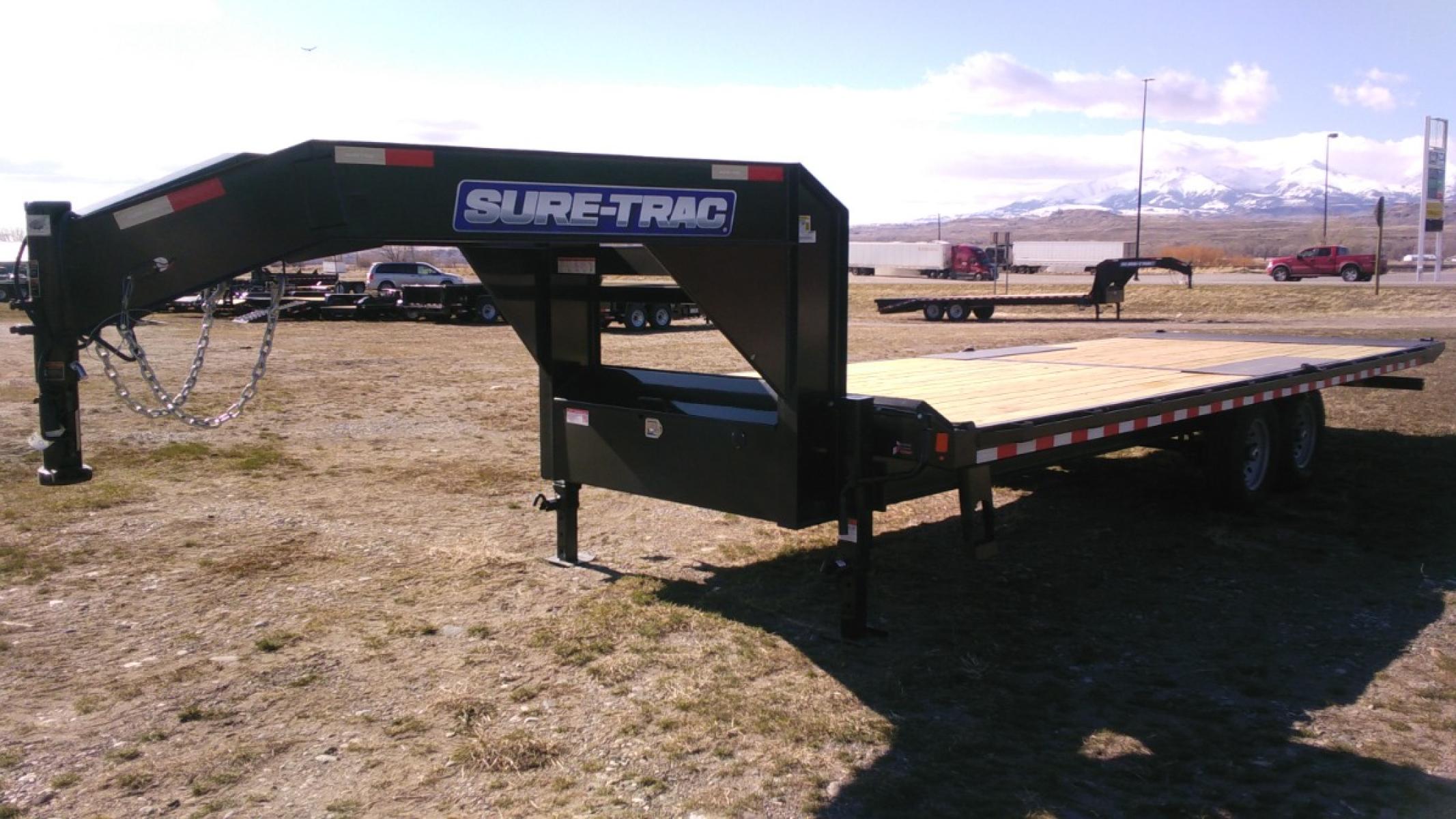 2022 Blk SureTrac 81/2 x 24 LoPro Power Tilt , located at 310 West 1st Ave, Big Timber, MT, 59011, (406) 860-8510, 45.833511, -109.957809 - SURE-TRAC 81-2 X 24 LOW PROFILE POWER TILT DECKOVER TRAILER W- DUAL RAM HOIST, 2 - 7K AXLES W- BRAKES AND EZ LUBE HUBS(15K GVW), 16"-10 PLY RADIAL TIRES, 12K JACK, SPARE TIRE CARRIER, LED LIGHTS, ADJUSTABLE 2 5-16 COUPLER, HD SLIPPER SPRING SUSPENSION, DEEP CYCLE MARINE BATTERY, PRESSURE TREATED WOO - Photo #4