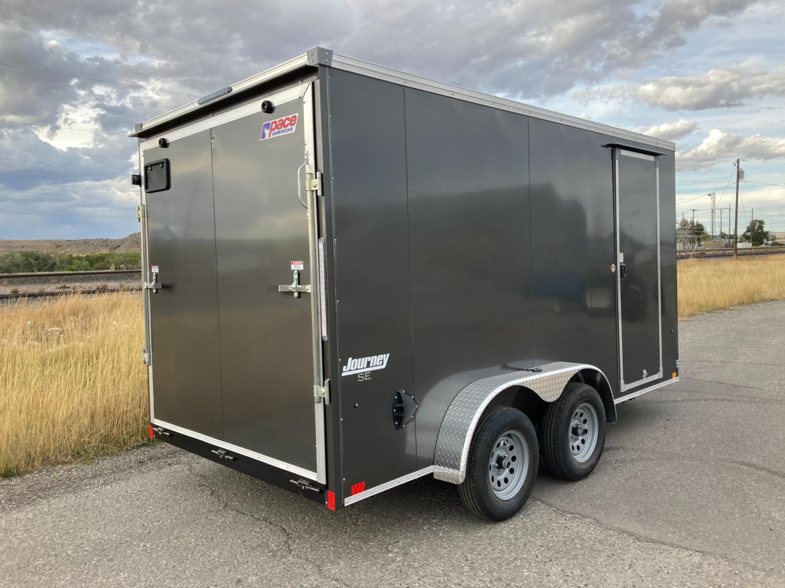 2023 White Pace Journey SE V-nose 7 x 14 , located at 310 West 1st Ave, Big Timber, MT, 59011, (406) 860-8510, 45.833511, -109.957809 - PACE 7 X 14 JOURNEY SE V-NOSE, 7K GVW, 78" REAR DOOR OPENING HEIGHT, REAR RAMP DOOR, SIDE VENTS, EZ LUBE HUBS, BRAKES ALL WHEELS, 15" RADIAL TIRES, BONDED EXTERIOR (NO SCREWS), 3/4" DRYMAX FLOOR, 3/8" DRYMAX SIDEWALL, DOME LIGHT, ROOF LINER, FLUSH DOOR HANDLE WITH KEY LOCK, LED LIGHTS, 16" ON CENTER - Photo #1