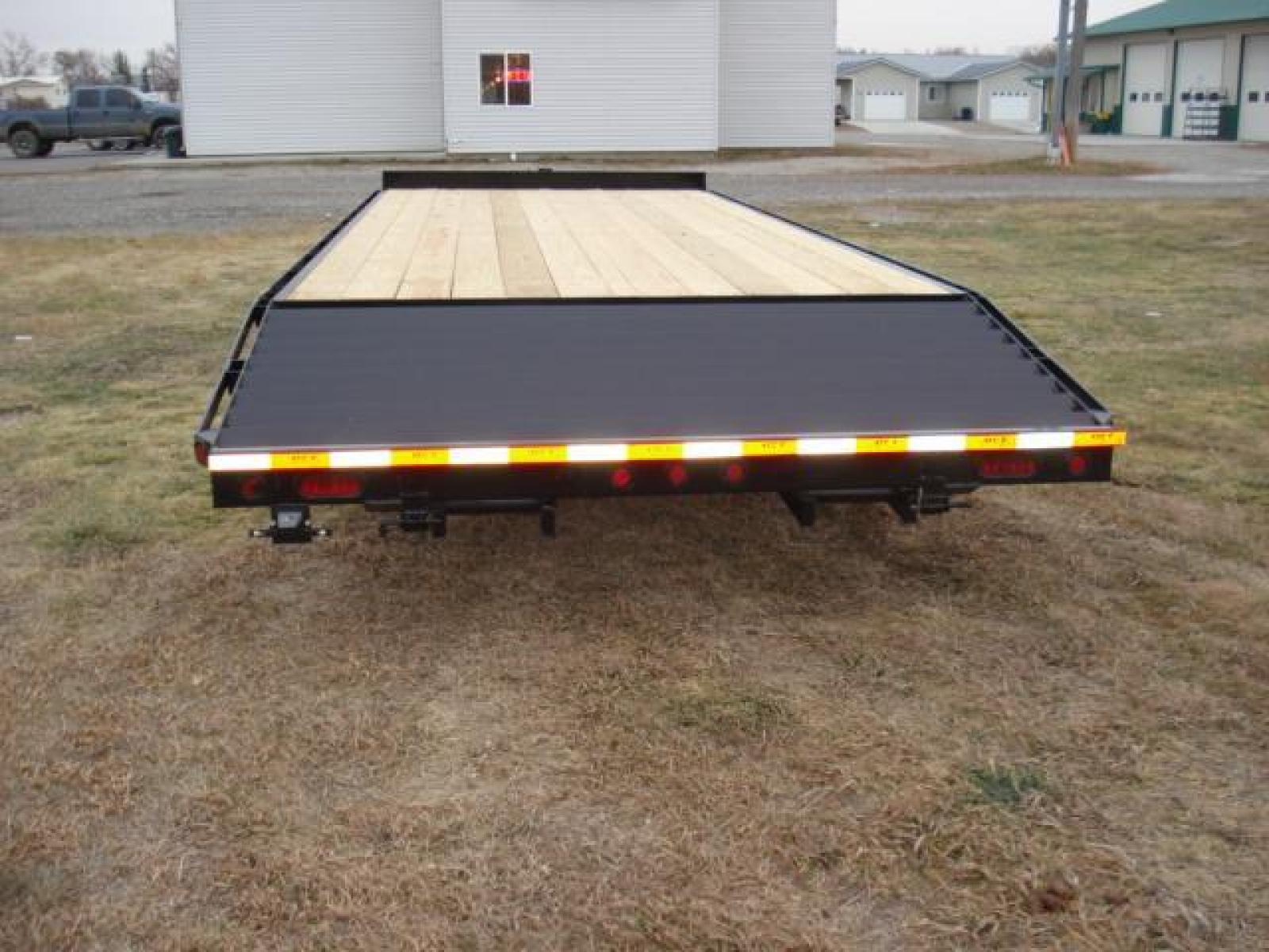 2022 Black DCT 81/2 x 20 + 4 Deckover Equip , located at 310 West 1st Ave, Big Timber, MT, 59011, (406) 860-8510, 45.833511, -109.957809 - DCT 81/2 X 20 + 4 DECKOVER BUMPER-PULL EQUIPMENT TRAILER, 4' DOVETAIL, 14K GVW, 2 - 7K AXLES W- EZ LUBE HUBS, HD SLIPPER SPRING SUSPENSION, 16"-10 PLY TIRES, 16" ON CENTER CROSS MEMBERS, LED LIGHTS, TREATED DECK, REAR RAMPS, 2-5-16 ADJUSTABLE COUPLER, 12K DROP FOOT JACK, STAKE POCKETS-RUB RAIL. T - Photo #4