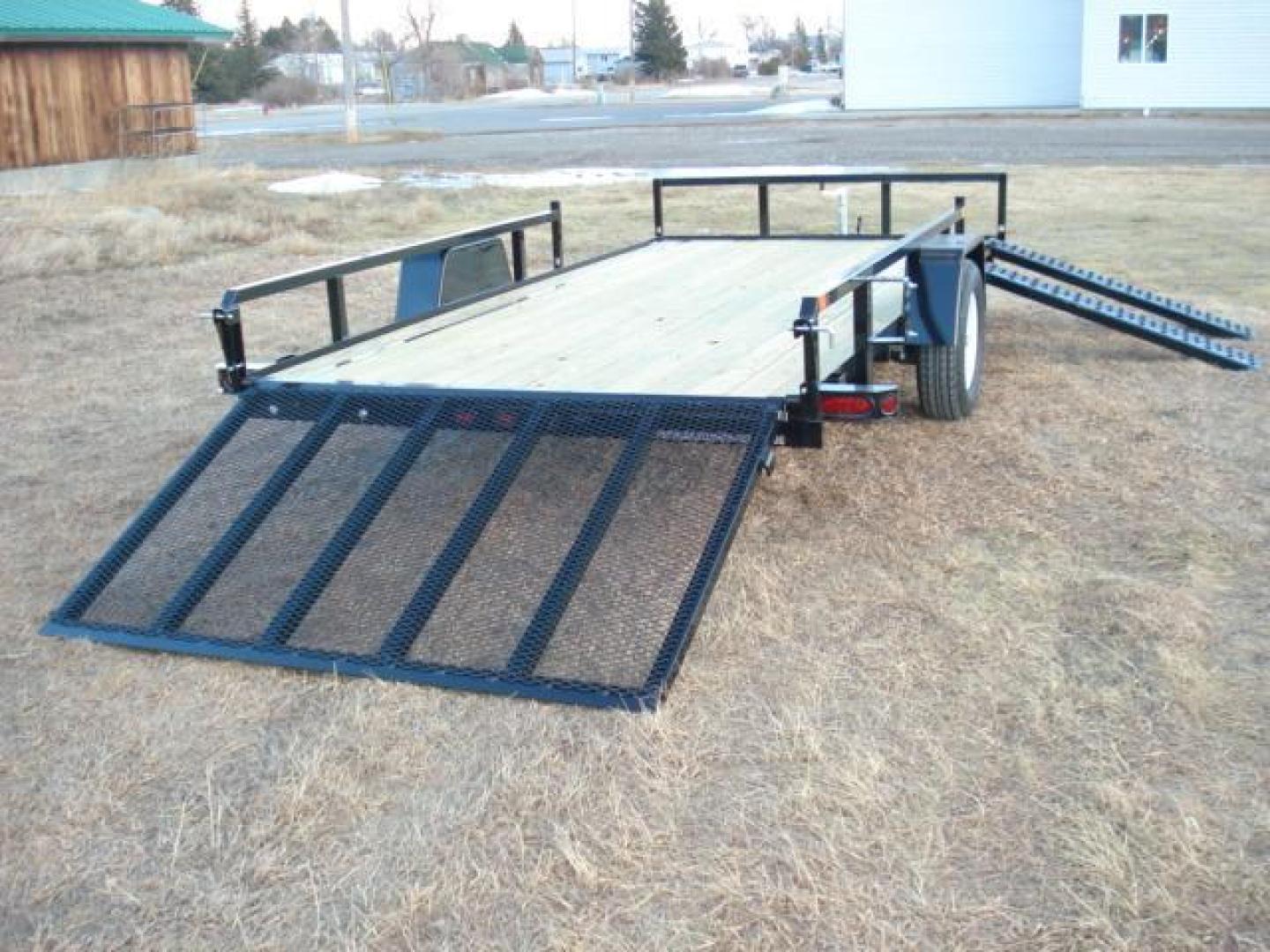 2025 Black SureTrac 7 x 14 ATV , located at 310 West 1st Ave, Big Timber, MT, 59011, (406) 901-0517, 45.833511, -109.957809 - SURE-TRAC 7 X 14 TUBE TOP ATV, 3K GVW, SIDE RAMPS, SPRING ASSISTED REAR RAMP, 15" RADIAL TIRES, TREATED WOOD DECK, LED LIGHTS, WIRING RUN IN CONDUIT, POWDER COAT FINISH, SPARE TIRE MOUNT. SURE-TRAC QUALITY FIT AND FINISH. OPTIONAL SPARE TIRE - $165.00. THE BEST TRAILERS AT THE BEST PRICE!!! Traile - Photo#1