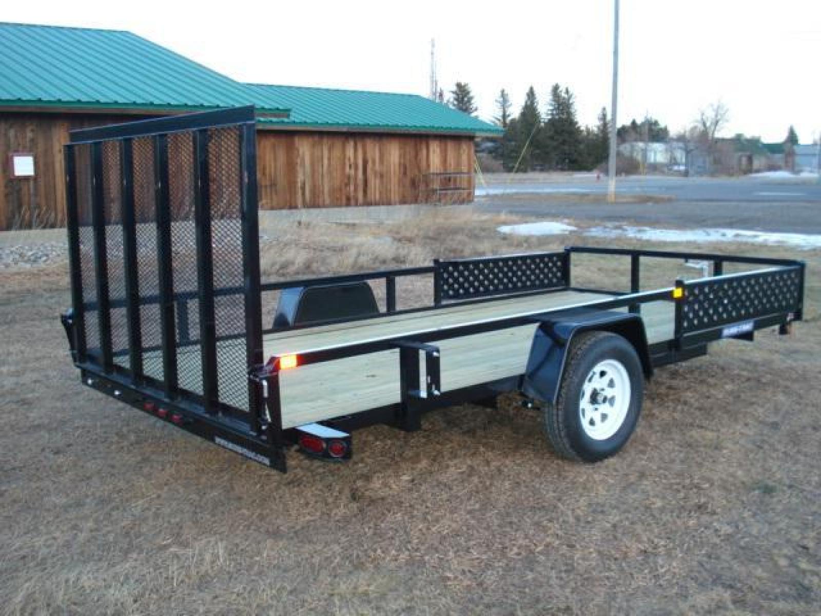 2023 Black SureTrac 7 x 14 ATV , located at 310 West 1st Ave, Big Timber, MT, 59011, (406) 860-8510, 45.833511, -109.957809 - SURE-TRAC 7 X 14 TUBE TOP ATV, 3K GVW, SIDE RAMPS, SPRING ASSISTED REAR RAMP, 15" RADIAL TIRES, TREATED WOOD DECK, LED LIGHTS, WIRING RUN IN CONDUIT, POWDER COAT FINISH, SPARE TIRE MOUNT. SURE-TRAC QUALITY FIT AND FINISH. OPTIONAL SPARE TIRE - $165.00. THE BEST TRAILERS AT THE BEST PRICE!!! Traile - Photo #2
