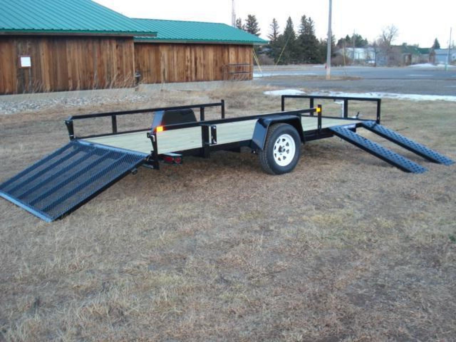2023 Black SureTrac 7 x 14 ATV , located at 310 West 1st Ave, Big Timber, MT, 59011, (406) 860-8510, 45.833511, -109.957809 - SURE-TRAC 7 X 14 TUBE TOP ATV, 3K GVW, SIDE RAMPS, SPRING ASSISTED REAR RAMP, 15" RADIAL TIRES, TREATED WOOD DECK, LED LIGHTS, WIRING RUN IN CONDUIT, POWDER COAT FINISH, SPARE TIRE MOUNT. SURE-TRAC QUALITY FIT AND FINISH. OPTIONAL SPARE TIRE - $165.00. THE BEST TRAILERS AT THE BEST PRICE!!! Traile - Photo #6