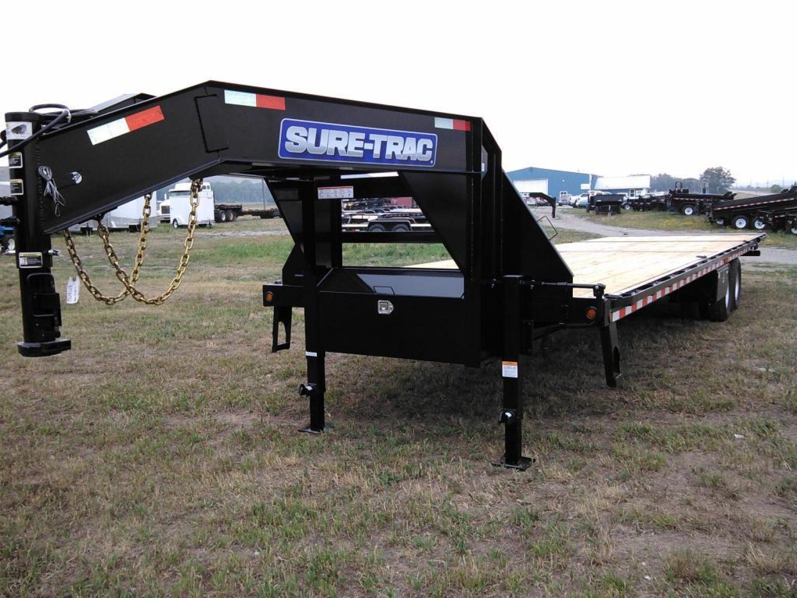 2023 Black SureTrac 81/2 x 35 GN Deckover w/ Power Dovetail , located at 310 West 1st Ave, Big Timber, MT, 59011, (406) 860-8510, 45.833511, -109.957809 - SURE-TRAC 81-2 X 35 GN DECKOVER W- 10' POWER BEAVERTAIL, 22.5K GVW, HYDRAUIC POWER UNIT W- DUAL CYLINDERS IN LOCKING TOOLBOX, 2 - 12K DROP LEG JACKS, TOOLBOX BETWEEN UPRIGHTS, 10 PLY - 16" RADIAL TIRES, ELECTRIC BRAKES ALL AXLES, OIL LUBRICATED BEARINGS IN AXLES, TREATED WOOD DECK, UNDERCOATED, HD S - Photo #2