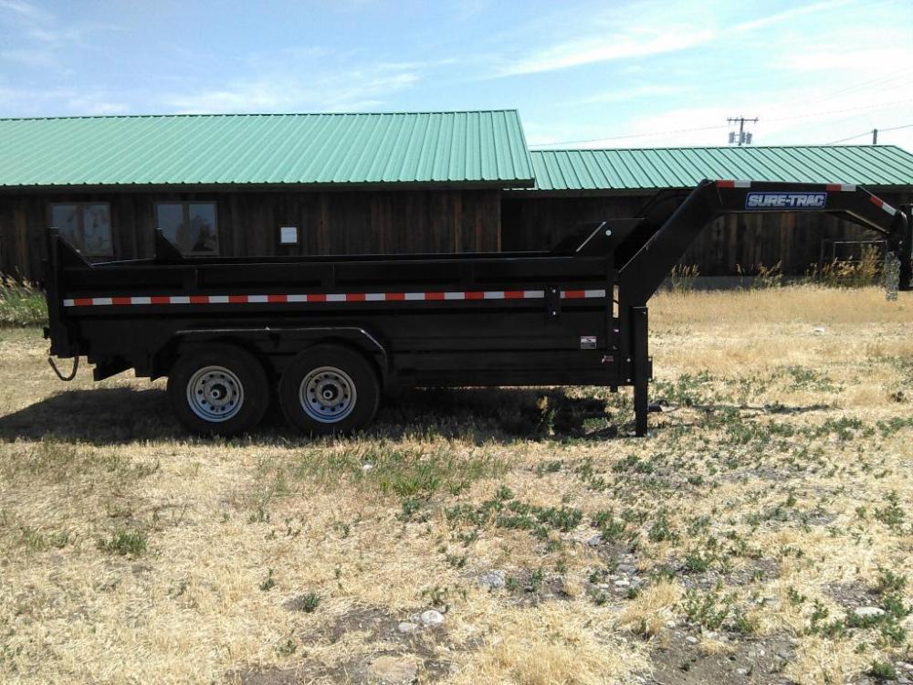 2022 Black SureTrac 7 x 14 GN LoPro Dump , located at 310 West 1st Ave, Big Timber, MT, 59011, (406) 860-8510, 45.833511, -109.957809 - NEW SURE-TRAC 7 X 14 LOPRO GN DUMP, 14K GVW, HD SCISSOR HOIST POWER UP-POWER DOWN, 10 GA FLOOR, HD SLIPPER SPRING SUSPENSION, 7K AXLES W- EZ LUBE HUBS, LED LIGHTS, ELECTRIC BRAKES BOTH AXLES, COMBO BARN DOOR-SPREADER REAR GATE, HD REAR STOW RAMPS, 10 PLY - 16