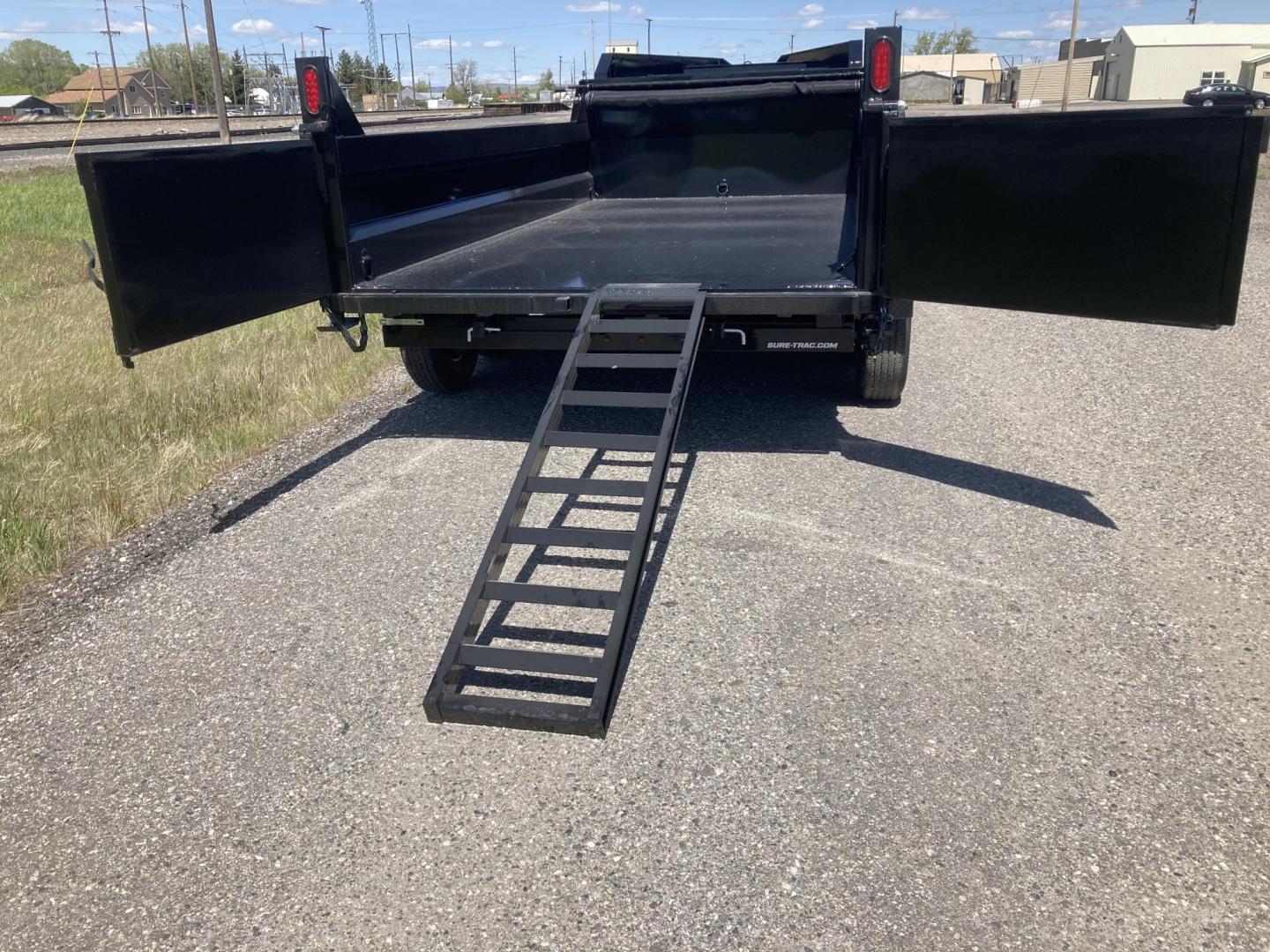2025 Black SureTrac 7 x 14 GN LoPro Dump , located at 310 West 1st Ave, Big Timber, MT, 59011, (406) 901-0517, 45.833511, -109.957809 - NEW SURE-TRAC 7 X 14 LOPRO GN DUMP, 14K GVW, HD TELESCOPIC HOIST, 10 GA FLOOR, HD SLIPPER SPRING SUSPENSION, 7K AXLES W- EZ LUBE HUBS, LED LIGHTS, ELECTRIC BRAKES BOTH AXLES, COMBO BARN DOOR-SPREADER REAR GATE, HD REAR STOW RAMPS, 10 PLY - 16" RADIAL TIRES, STAKE POCKETS, ADJUSTABLE GN COUPLER, (5) - Photo#5