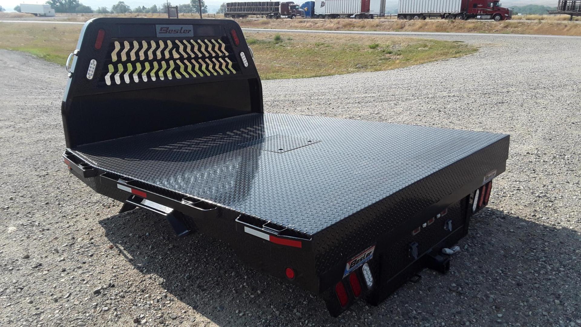 2024 Black Besler Flatbed , located at 310 West 1st Ave, Big Timber, MT, 59011, (406) 901-0517, 45.833511, -109.957809 - ALL NEW BESLER 6000, 7000, 8000 and 9000 SERIES FLATBEDS, GN HITCH W- 30K TOW BALL, REAR RECEIVER HITCH, 7 ROUND TRAILER PLUG, LED LIGHTS, STAKE POCKETS-RUB RAIL, TAPERED REAR CORNERS., POWDERCOATED FINISH. INSTALLATION AVAILABLE FOR AN ADDITIONAL FEE BUY THE BEST- BUY A BESLER! Model 6087 (SRW - Photo#1