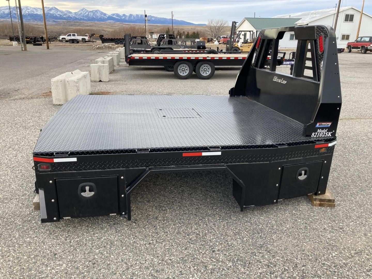 2024 Black Besler Flatbed , located at 310 West 1st Ave, Big Timber, MT, 59011, (406) 901-0517, 45.833511, -109.957809 - ALL NEW BESLER 6000, 7000, 8000 and 9000 SERIES FLATBEDS, GN HITCH W- 30K TOW BALL, REAR RECEIVER HITCH, 7 ROUND TRAILER PLUG, LED LIGHTS, STAKE POCKETS-RUB RAIL, TAPERED REAR CORNERS., POWDERCOATED FINISH. INSTALLATION AVAILABLE FOR AN ADDITIONAL FEE BUY THE BEST- BUY A BESLER! Model 6087 (SRW - Photo#0
