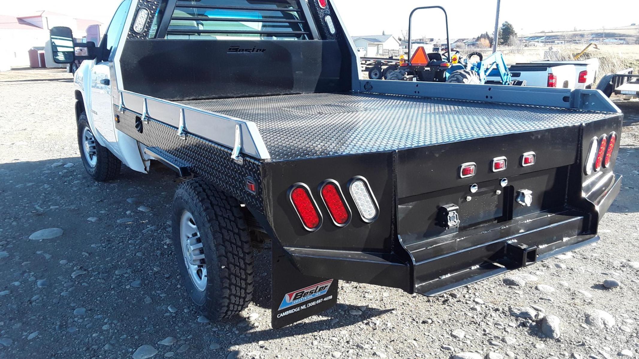 2022 Black Besler Flatbed , located at 310 West 1st Ave, Big Timber, MT, 59011, (406) 860-8510, 45.833511, -109.957809 - ALL NEW BESLER 6000 SERIES FLATBED, GN HITCH W- 30K TOW BALL, REAR RECEIVER HITCH, 7 ROUND TRAILER PLUGS, LED LIGHTS, STAKE POCKETS-RUB RAIL, TAPERED REAR. 7 X 7 FOR SHORT WHEEL BASE PU - $4,295.00. 7 X 81-2 FOR LONG WHEEL BASE PU - $4,295.00.	FOLD DOWN SIDES - ADD $200.00. INSTALLATION AVAIL - Photo #0