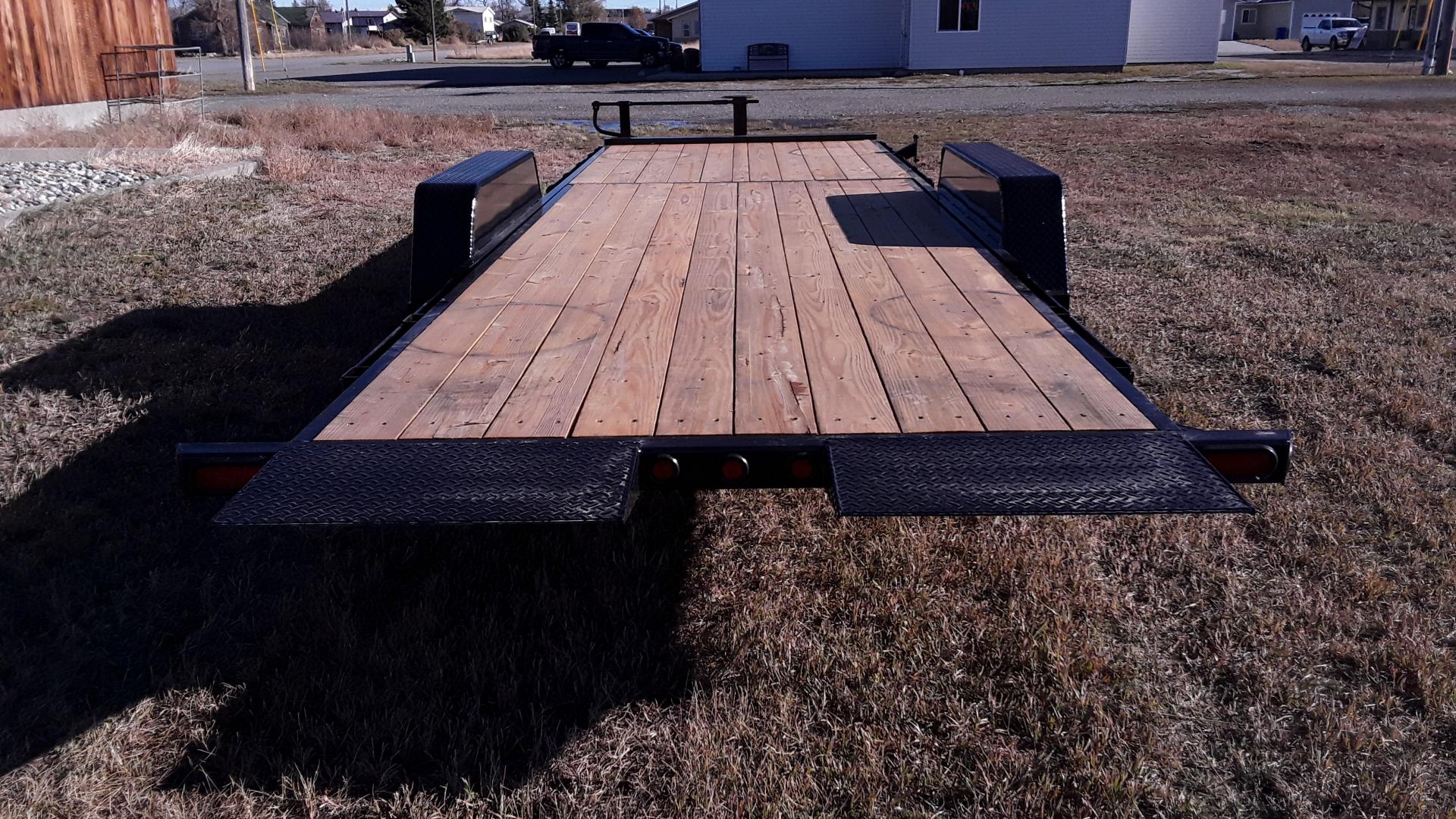 2025 Black Kaufman 7 x 14 + 8 Equipment Tilt , located at 310 West 1st Ave, Big Timber, MT, 59011, (406) 901-0517, 45.833511, -109.957809 - New Kaufman Deluxe 7 x 14 + 8 Equipment Tilt, 15K GVW, 2 - 7K axles with EZ lube hubs and electric brakes, 8' stationary - 14'-6" tilt, hydraulic cushion cylinder, treated wood deck, HD slipper spring suspension, 16" - 10 ply radial tires, 6" c-channel frame, 6" c-channel full wrap tongue, 3" channe - Photo#2