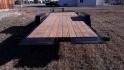 2025 Black Kaufman 7 x 14 + 8 Equipment Tilt , located at 310 West 1st Ave, Big Timber, MT, 59011, (406) 901-0517, 45.833511, -109.957809 - New Kaufman Deluxe 7 x 14 + 8 Equipment Tilt, 15K GVW, 2 - 7K axles with EZ lube hubs and electric brakes, 8' stationary - 14'-6" tilt, hydraulic cushion cylinder, treated wood deck, HD slipper spring suspension, 16" - 10 ply radial tires, 6" c-channel frame, 6" c-channel full wrap tongue, 3" channe - Photo#2