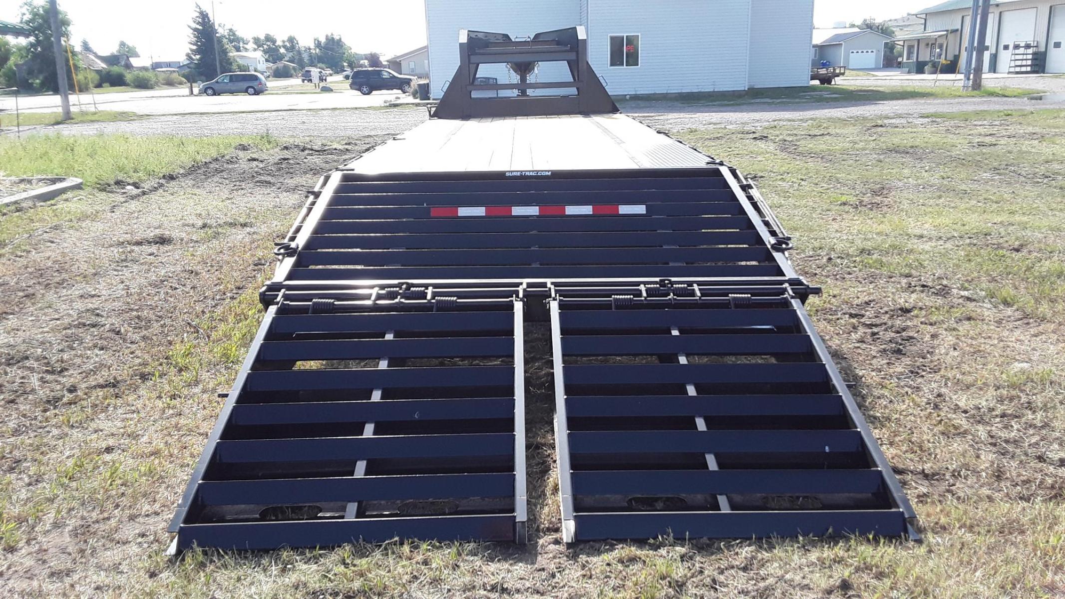 2023 SureTrac 81/2 x 25 GN Deckover , located at 310 West 1st Ave, Big Timber, MT, 59011, (406) 860-8510, 45.833511, -109.957809 - 2021 SureTrac 81/2 x 20 + 5 GN Deckover, 15K GVW, HD slipper spring suspension, EZ lube hubs, electric brakes both axles, LED lights, 16"-10 ply radial tires, 2" treated wood deck, (2) 12K drop leg jacks, center mounted tool box, rub rail, stake pockets, chain spools, 3" c-channel cross members on 1 - Photo #5