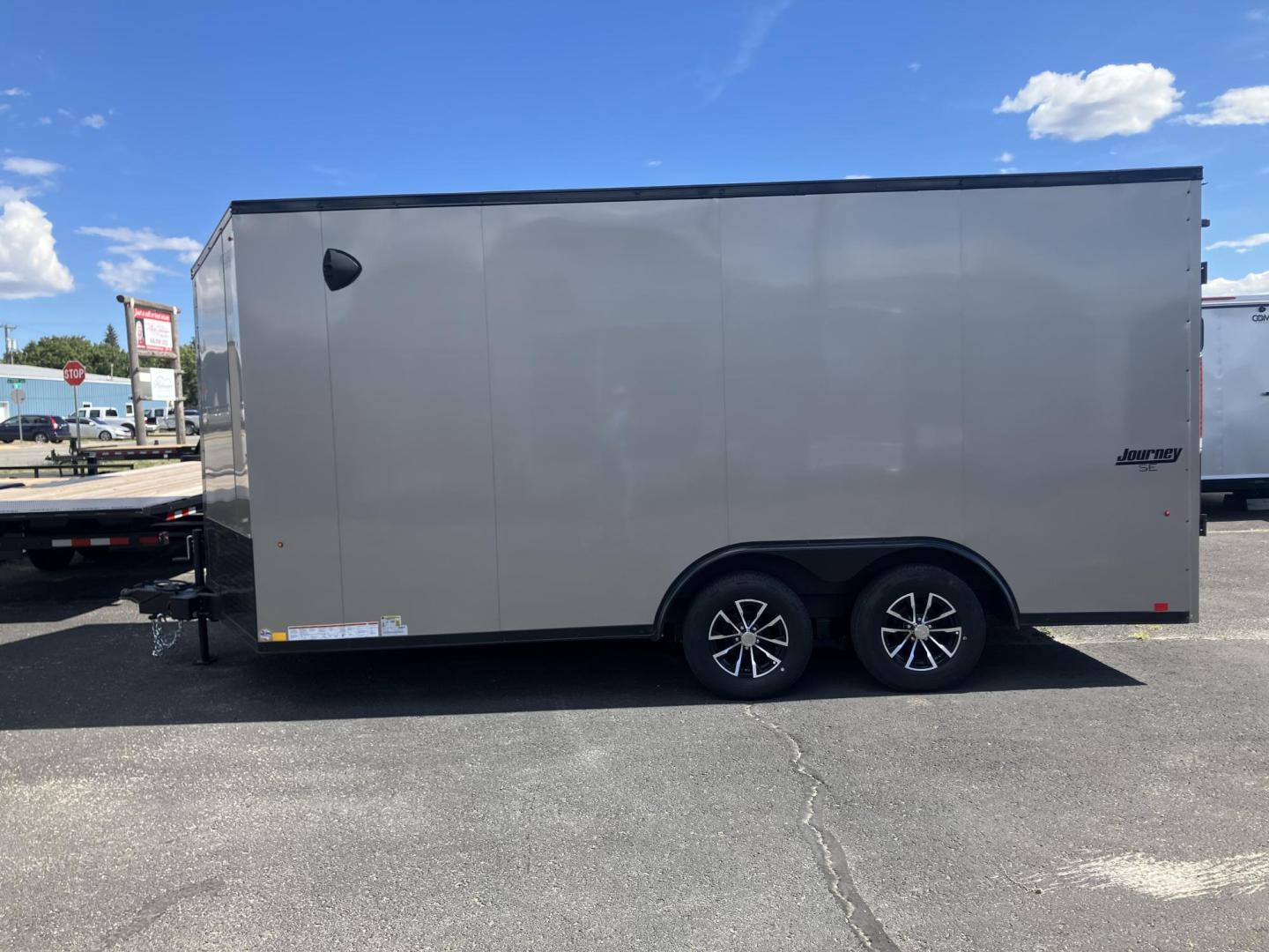 2026 , located at 310 West 1st Ave, Big Timber, MT, 59011, (406) 901-0517, 45.833511, -109.957809 - New Pace American Journey SE 81/2 x 16 Enclosed Cargo, 7k GVW, 81" rear door opening height with beavertail, bonded sides (no screws), v-nose, rear ramp door, 32" side door, (2) 3.5k axles, electric brakes on both axles, LED lights, high performance floor and sidewall material, 16" on center sidewal - Photo#0