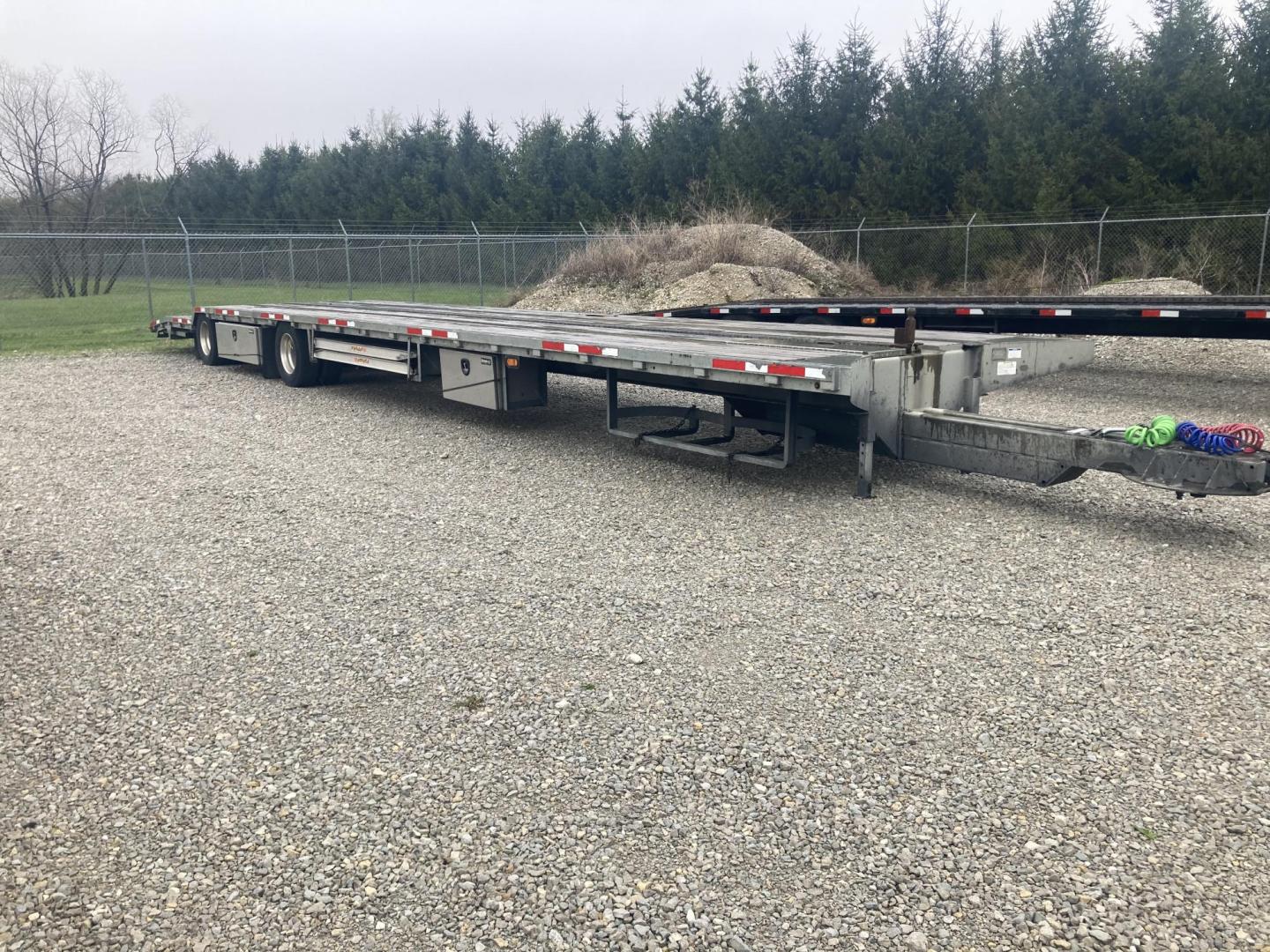 2019 , located at 310 West 1st Ave, Big Timber, MT, 59011, (406) 901-0517, 45.833511, -109.957809 - 2019 MO 43' Stinger trailer, 50K GVW, air brakes, tire inflation system, 245/70R-17.5-16 ply tires, alloy wheels, galvanized frame, wood deck, aluminum ramps, (3) toolboxes, hydraulic rear tail extension, center rail for securing trailers, spare tire holder, stake pockets, rub rail, LED lights, spre - Photo#2