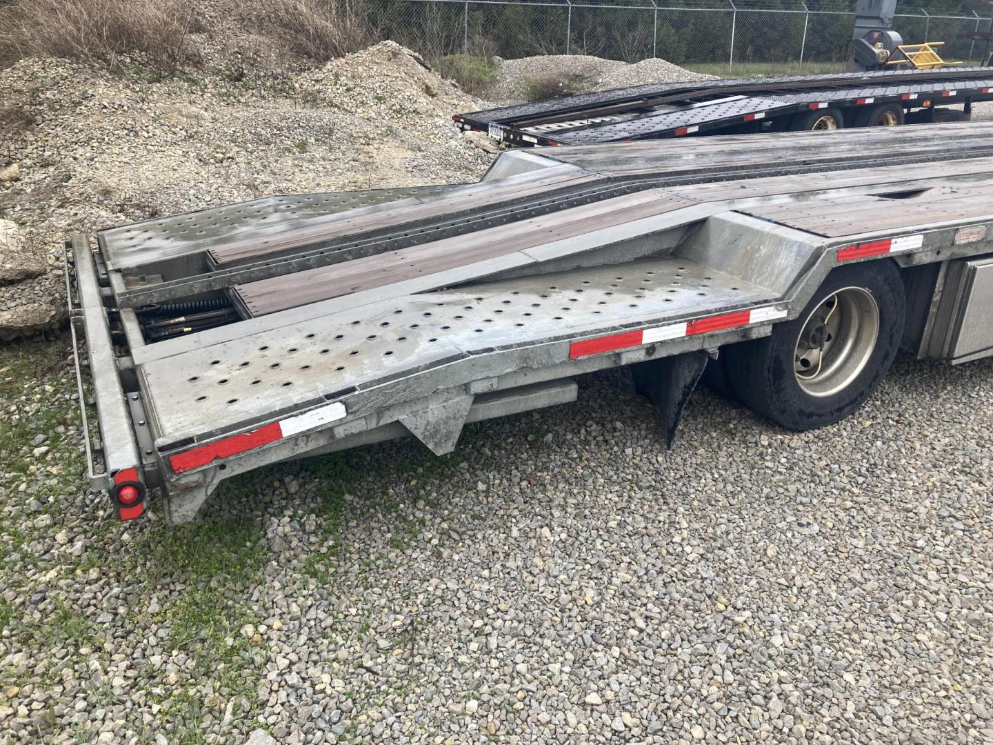 2019 , located at 310 West 1st Ave, Big Timber, MT, 59011, (406) 901-0517, 45.833511, -109.957809 - 2019 MO 43' Stinger trailer, 50K GVW, air brakes, tire inflation system, 245/70R-17.5-16 ply tires, alloy wheels, galvanized frame, wood deck, aluminum ramps, (3) toolboxes, hydraulic rear tail extension, center rail for securing trailers, spare tire holder, stake pockets, rub rail, LED lights, spre - Photo#3