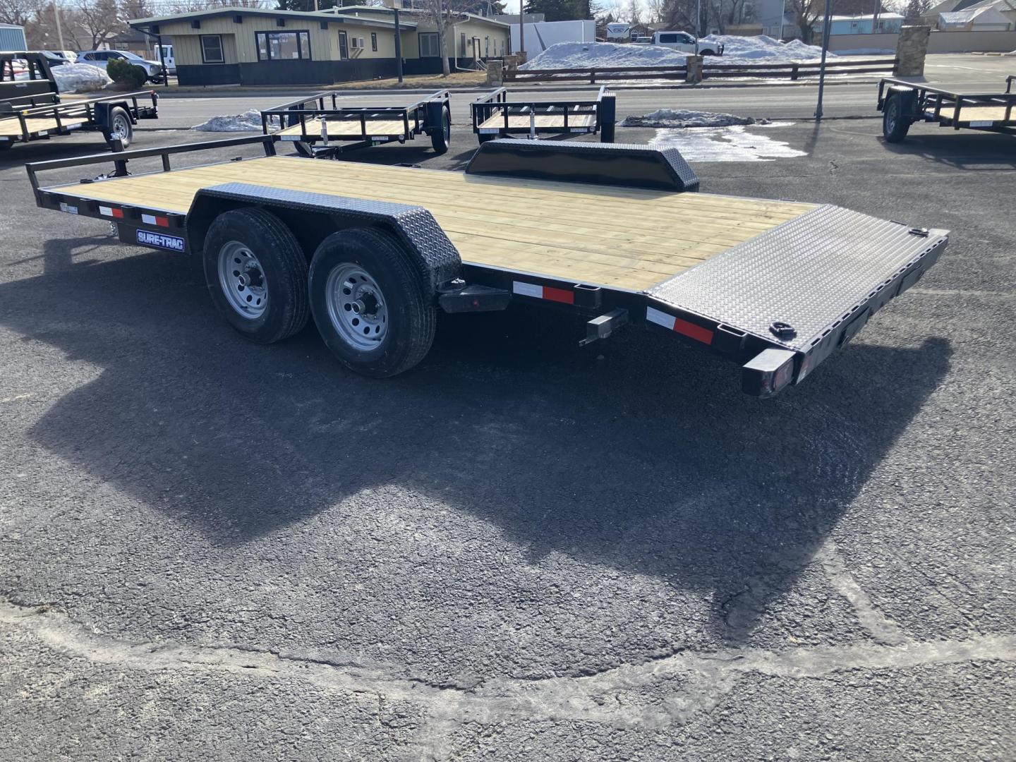 2025 , located at 310 West 1st Ave, Big Timber, MT, 59011, (406) 901-0517, 45.833511, -109.957809 - SureTrac 7 x 18 Car Hauler, 10K GVW, (2) 5k axles with quick lube hubs, spring suspension, treated wood deck, all LED lights, (4) d-ring tie-downs, electric brakes on all axles, 5' rear stow ramps, 7K set back drop leg jack, breakaway switch with battery, stake pockets, 5" C-channel tongue, powder c - Photo#1